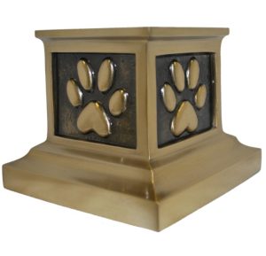 Beautiful brass urn with a paw print to memorialize a pet